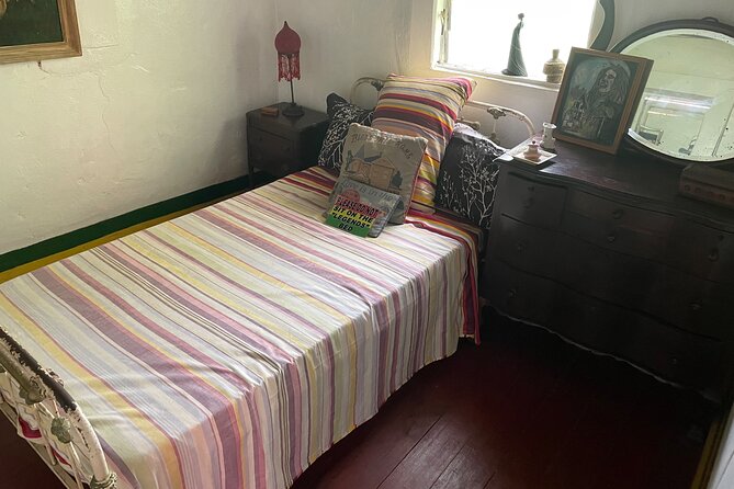 Bob Marley's Nine Mile Mausoleum Tour (Complimentary Rum Punch) - Walking through Bob Marley’s childhood home