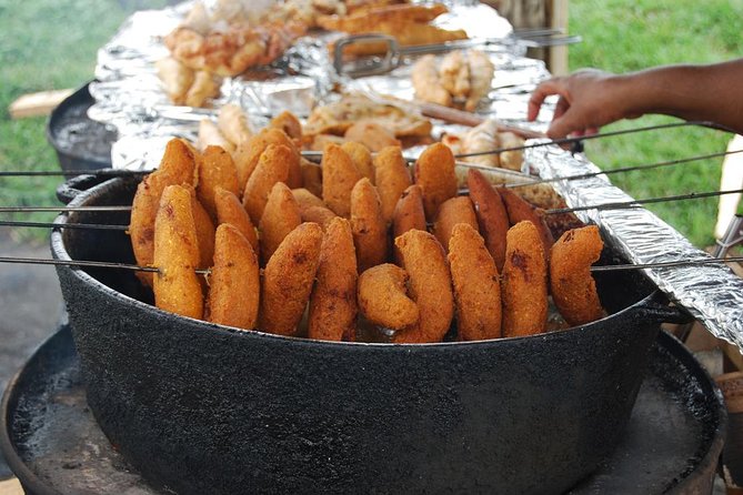 Boriken Flavor: Roast Pork Hwy, Rum Tasting, Loiza Fritters - Starting at La Placita and tasting the island’s fruit