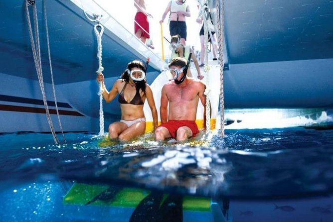 Key West Rum and Reggae: Reef Snorkel Adventure and Sunset Sail - Leaving Front Street for Key West’s living reef